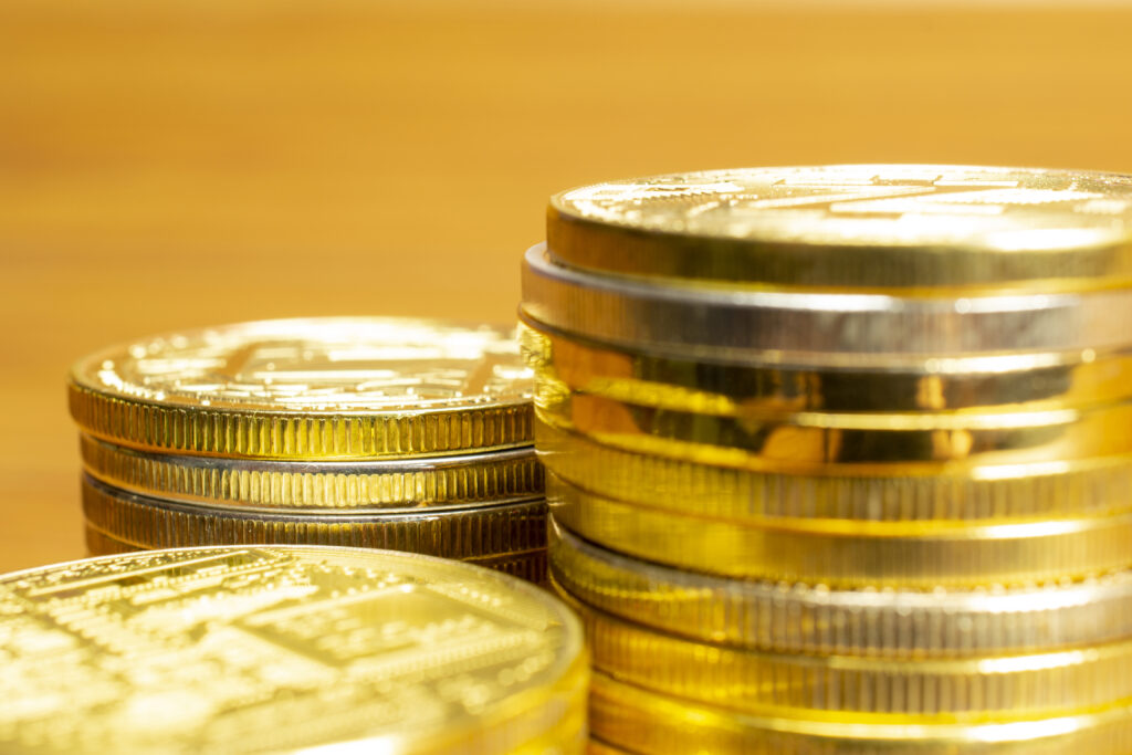 Rows, stacks of coins with blurred background, selective focus o