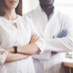 Laboratory laboratories conduct experiments in a chemical laboratory in transparent flasks. Output formulas