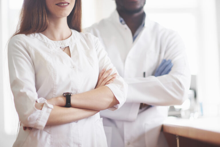 Laboratory laboratories conduct experiments in a chemical laboratory in transparent flasks. Output formulas